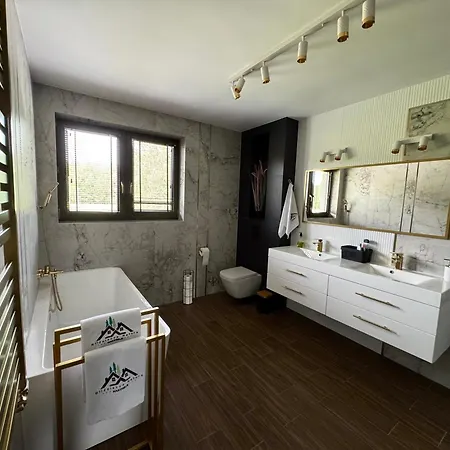 Апартаменты Blizniacza Natura Nad Rzeka,
